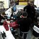 Otis Gooding (black man in center) right before an e-cigarette exploded in his pocket
YouTube Screenshot